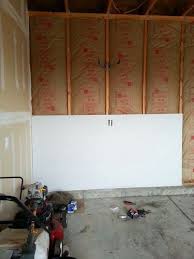Finishing The Garage Part 1 Insulating And Drywalling Walls And Ceiling Garage Drywall Garage Doors Garage Insulation Diy