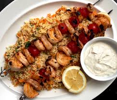 Stir in the nuts, apricots, preserved lemon, herbs and lemon juice and season well with salt and pepper. Barbecued Prawn Kebabs With Harissa Couscous Jono Jules Do Food Wine