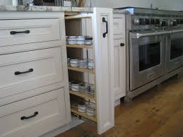 They are nothing more than a line, or a series of lines, cut into the face of a cabinet or a cabinet's doors and drawers. Pull Out Spice Cabinet Cottage Kitchen Wesley Ellen Design Millwork