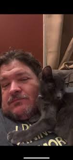 Lucie Playing peek a boo with uncle Steven