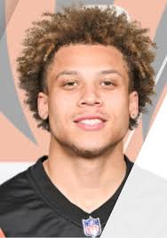 Jermaine Burton with teammates at King Island