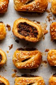 Roll the pastry over the sausage until it overlaps on itself slightly and make a mark. Mini Vegan Sausage Rolls Lazy Cat Kitchen