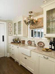 Beautiful cream colored kitchen with brown walls and marble backsplash. Farmhouse Sink Design Ideas Pictures Remodel And Decor Traditional Kitchen Design Country Kitchen Designs Kitchen Remodel