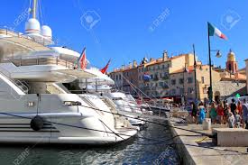 Please don't curse, don't ask for follows, please don't ask personal. Saint Tropez Provence France August 21 2016 Tourists In The Old Port Of St Tropez Admiring The Expensive Luxury Yachts Stock Photo Picture And Royalty Free Image Image 64331362