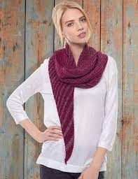 The marina knit shawl pattern is an asymmetrical shawl made with three colors and uses slipped stitches for a beautiful yet easy striped colorwork design. Asymmetrical Shawl Allfreeknitting Com