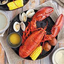 Pour in the vermouth and enough chicken broth to fill the pot halfway. Maine Lobster Bake Recipe Myrecipes