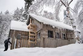 The famous smugglers' notch is a narrow pass through the green mountains. 7 Cabins In Vermont Where You Can Stay Cozy This Winter