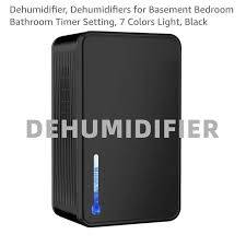 Black compact dehumidifier with colored light display