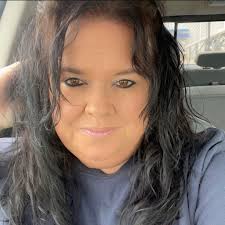 woman struggling with perimenopause symptoms