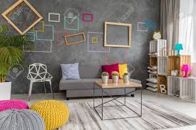 The white and pale shades of grey open up the room while the clear. Modern Living Room Designed In Grey Pink And Yellow Colors Stock Photo Picture And Royalty Free Image Image 68146878