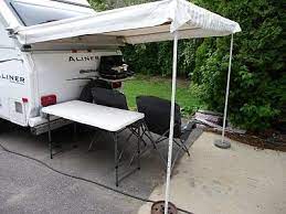Quick Setup Rear Awning For Shaded Seating And Outside Kitchen Modified Coleman Awning From Fabric Sided Pop Up Type Cam Aliner Campers Camper Awnings Awning
