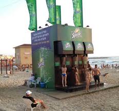 Here S A Creative Branded Item Beach Showers That Look Like A Sprite Fountain Machine Guerilla Marketing Marketing De Rue Publicite