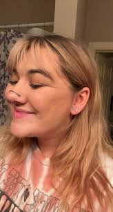 nostril chain and triple lobe by amanda salois at 15th st tattoo gallery in  edmond, ok : r/bodymods