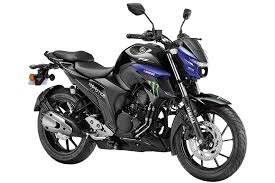 The new introduction gets yamaha moto gp branding on the tank shrouds, the fuel tank and side panels, outlining its racing background and has been launched as a part of the company's 'the call of the blue' campaign, india yamaha motor said in a statement. Bs6 Yamaha Fz 25 Motogp Edition Launched Details Price Difference Explained The Financial Express