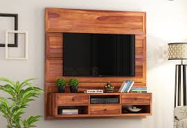 Shop our best selection of tv wall units & floating entertainment shelves to reflect your style and inspire your home. Buy Snapple Wall Mount Tv Unit Honey Finish Online In India Wooden Street