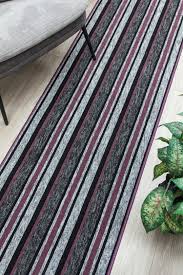 Not only do runners protect your flooring from wear and tear, but they can also make a huge design impact on a narrow space. Alba Kitchen Hall Runner Mat Grey Purple