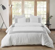 The luxurious 300 thread count fabric creates a softer feel and more pleasing sleep experience, available in several fashionable colors. Stylish White Oversized Twin Xl Duvet Cover To Fit Twin Or Twin Xl Bed With Gray Border Design