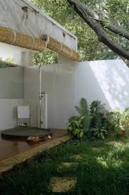 If you didn't know this outdoor shower was here, you'd likely walk right past it. 50 Refreshing Outdoor Shower Ideas For An Easy Breezy Summer