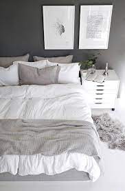 Gray primary bedroom with a modern bed and a desk on the side. Grey And White Bedroom Ideas Create Rooms Of High Class Decoholic