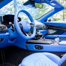 Image result for Slate Blue 2010 Aston Martin