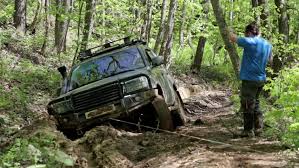 A hammer, and three 12 x 1/2 rebar (18 is better if you can fit them in our storage compartments) stakes in an x with a l in the middle of the x will pull you out of all but the soggiest of ground. Expeditionary Suv Got Stuck In Stock Footage Video 100 Royalty Free 27867751 Shutterstock