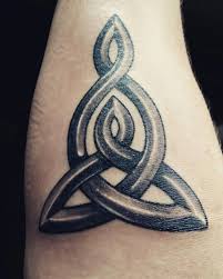 This tattoo includes four black inked footprints, each with a name, tatted in the curvy font. Mother And Son Tattoo Ideas Tattoo Designs For Mothers And Their Kids Body Tattoo Art