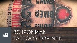 This ironman triathlon tattoo is done with a splash of color and some red ink. Ironman Triathlon Tattoo Triathlon All Around