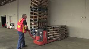Pallet jacks are one of the most essential tools on a work site. Powered Pallet Truck Moving A Load Youtube