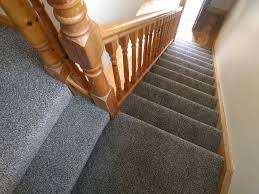 Carpeting in a bold color or pattern for the stairs looks more intentional than bland beige. Stairs And Landing Fitted In Mink Colour Carpet Stairs Mink Colour Occasional Chairs