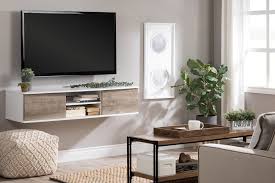 Add some floating shelves above your tv to draw the eyes up. 12 Stylish Ideas For Decorating Around A Tv Set Tlc Interiors