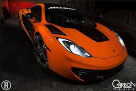 Black And Orange Car Wrap Sweet Mclaren Wrapped In 3m 1080 Gloss Burnt Orange Black Carbon Fiber Satin Black By Carbon Wraps Http Www Carbonwrapso Orange Car Black Car Car Wrap