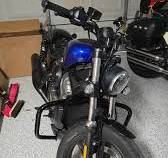Customized harley davidson seat with purple diamonds