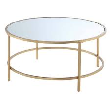 Sleekly curved, and drawing the eye around its glorious smooth edge, a round coffee table seems softer, somehow, than the classically angled square tables. Gold Coast Mirrored Round Coffee Table Mirrored Top Gold Breighton Home Target