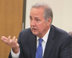 City seeks Holcombe suit dismissal