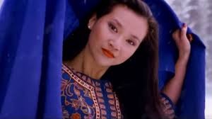 SG Arts Museum works with artist playfully defying SIA's demure 'Singapore  Girl'