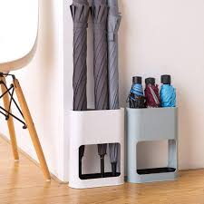 Use the frame's convenient crank system to adjust the protective canopy's height and angle to shield your wicker dining table or sleek lounge chairs from the sun's uv rays. 12 Best Indoor Umbrella Stands That Look Nice 2019 The Strategist