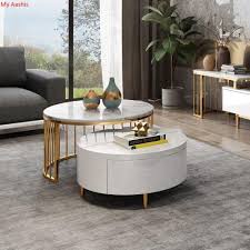 Featuring a classic design with timeless elegance, the stone style coffee table is so versatile and convenient. Contemporary Wooden Round Rotating Marble Coffee Table With Storage My Aashis