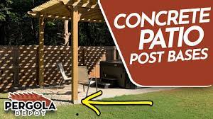 If you'll be adding a patio later, be sure to pour all the footings at the finished patio height as part of your pergola designs. How To Install Pergola Post Bases On A Concrete Patio Youtube