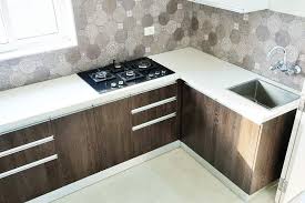 When it comes to kitchen wall decor ideas, it's important to find art, pictures, signs, accessories and decorations that really speak to you. Indian Kitchen I Love The Hob And That White Quartz Counter And That Spanish Quartz Kitchen Countertops White Kitchen Tiles Design Quartz Kitchen Countertops