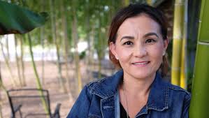 Hmong woman keeps families together