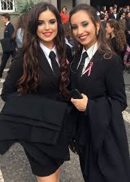 Students Girls Dressed Formal In Black Skirt Suits White Shirts And Black Ties Student Girl Girl Suits Black Skirt Suit