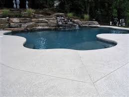 The Cool Deck Overlay On This Concrete Pool Deck Made It More Appealing Durable And Slip Resistant Dial 323 Pool Decking Concrete Pool Decks Concrete Pool