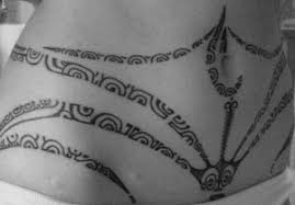That being said, some of the more popular lower back tattoo designs have wavy lines that wrap around the lower back and usually have a star, flower ( hibiscus flower designs ), name, butterfly, bow ( bow tie tattoos ), ribbon. Faminine Tattoos