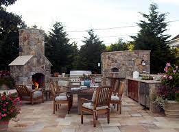 Centering the seating area around it makes it easier for guests to bask in the warm glow. Stone Barbecue Fireplace The Highlight In The Garden Interior Design Ideas Ofdesign