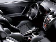 In profile, it almost looks interior design and special features:bolstered sport seats help keep you in place during enthusiastic cornering, and a large speedometer and. 2003 2005 Hyundai Tiburon V6 Gt Tiburon V6 Se Review Modern Racer Auto Archive