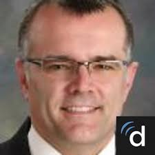 Dr. Calvin L. Schuster, MD