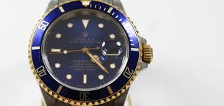 rolex submariner armbanduhr herren mit datumsanzeige aus stahl und gold blaues zifferblatt faltschliesse https www i rolex rolex submariner armbanduhr herren