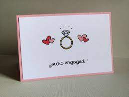 Love is in the air, and a special wedding card is the perfect way to help commemorate a couple's big day. Engagement Card Engagement Cards Diy Engagement Cards Wedding Cards