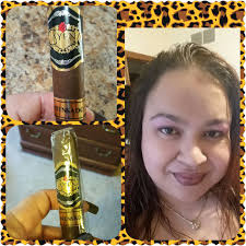 Oscar "Ringo" Bonavena smokes a cigar