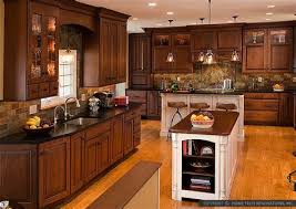 Furthermore, the backsplash matches the color of the fixtures and the flooring. Kitchen Backsplash Ideas With Brown Cabinets Marble Backsplash Ideas Design Photos And Pictures Brown Is An Easy Color To Maintain Quickly Hiding Spills And Splashes Foodbloggermania It